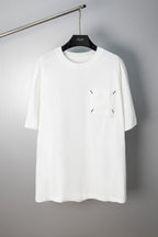 White crew-neck T-shirt with small stitched emblem on chest