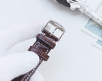 Longines wristwatch leather strap with silver buckle and stitched brown strap