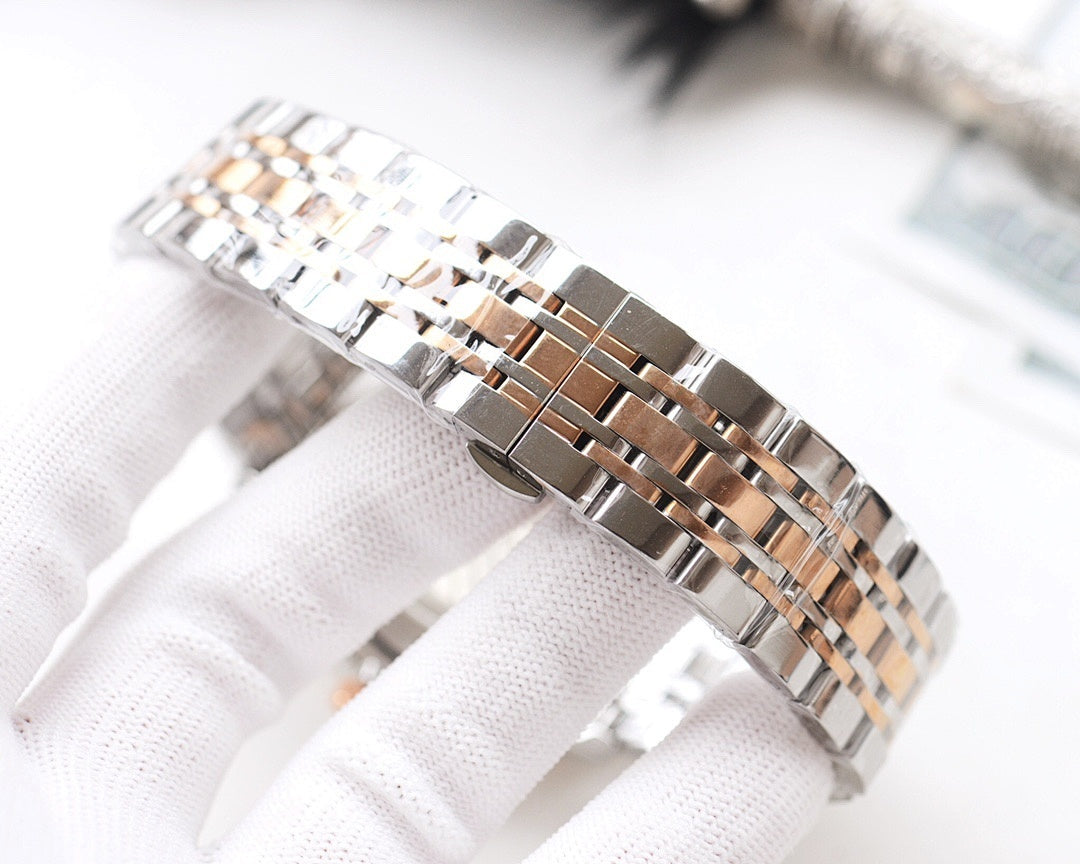 Two-tone metal watch bracelet with alternating polished and brushed links