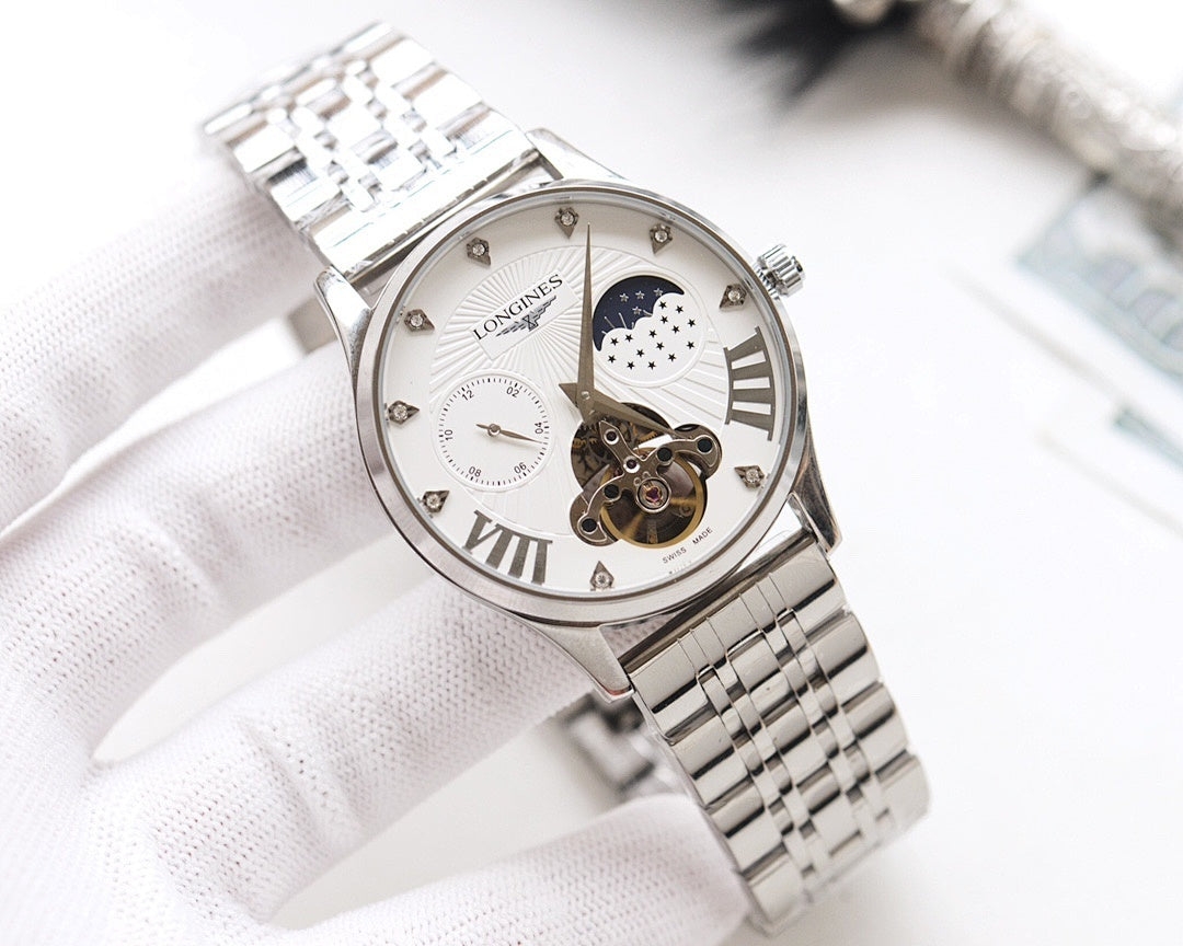 Stainless steel watch with white dial, skeleton details, and metal link bracelet