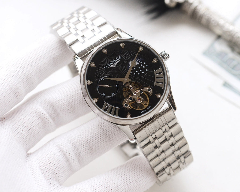 Black dial stainless steel watch with gold hands and metal link bracelet