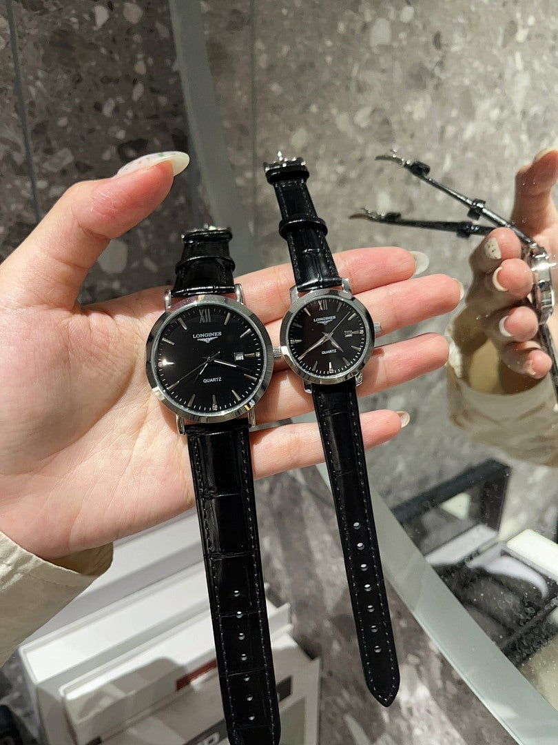 Longines watch with black dial and black leather strap, two round cases on hand