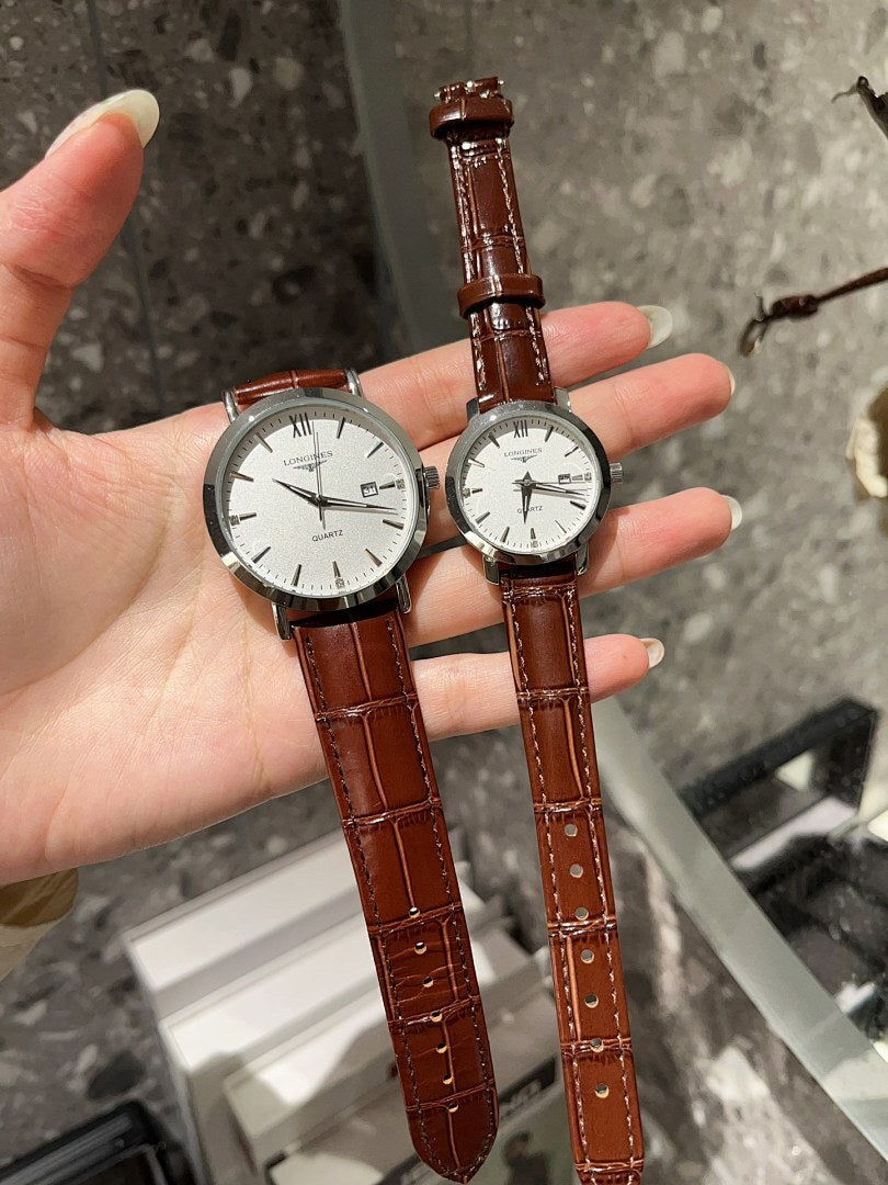 Longines watch with white dial and brown leather strap, two round cases on hand