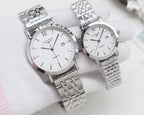 Quartz wristwatch set with white dials and silver metal link bracelets