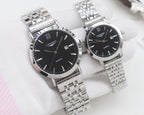 Quartz wristwatch set with black dials and silver metal link bracelets