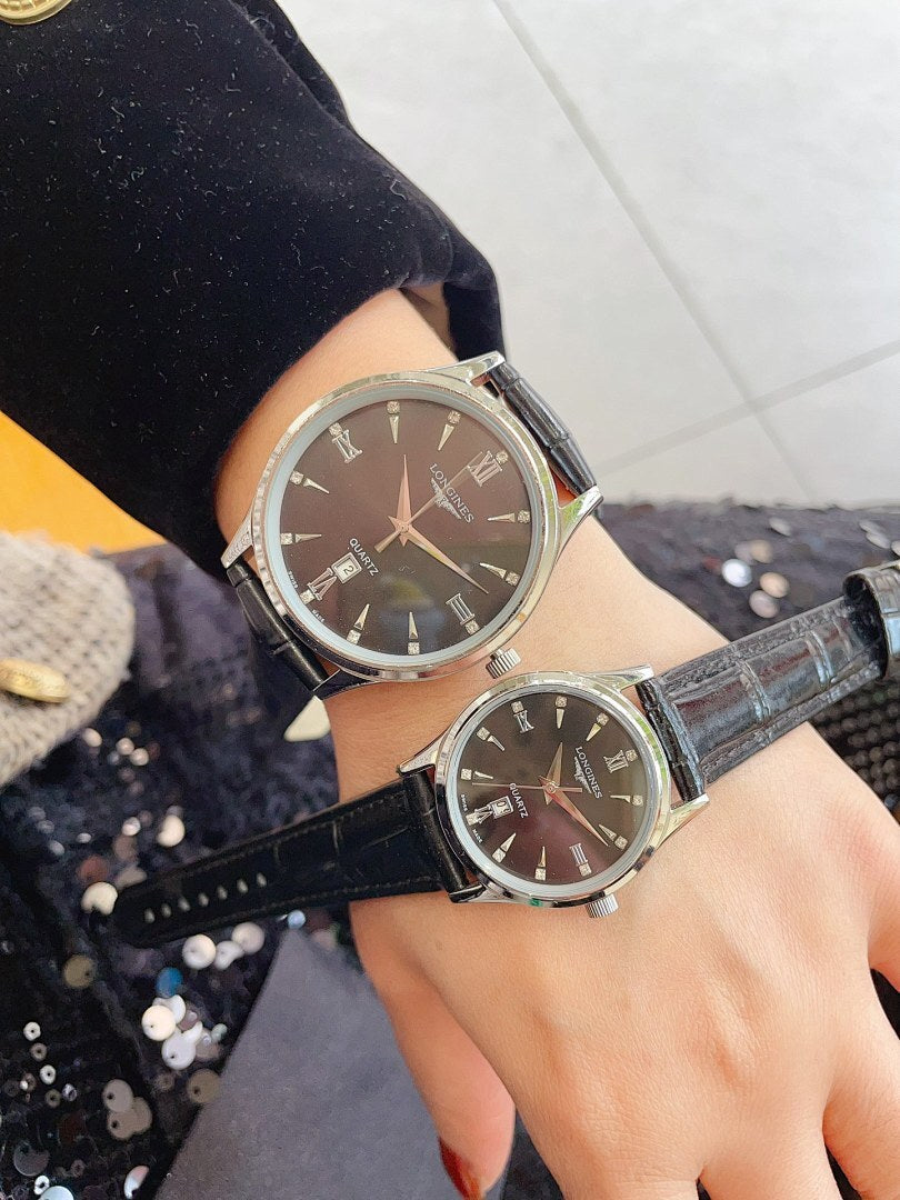 Pair of Longines watches with dark dials and black leather straps, silver cases