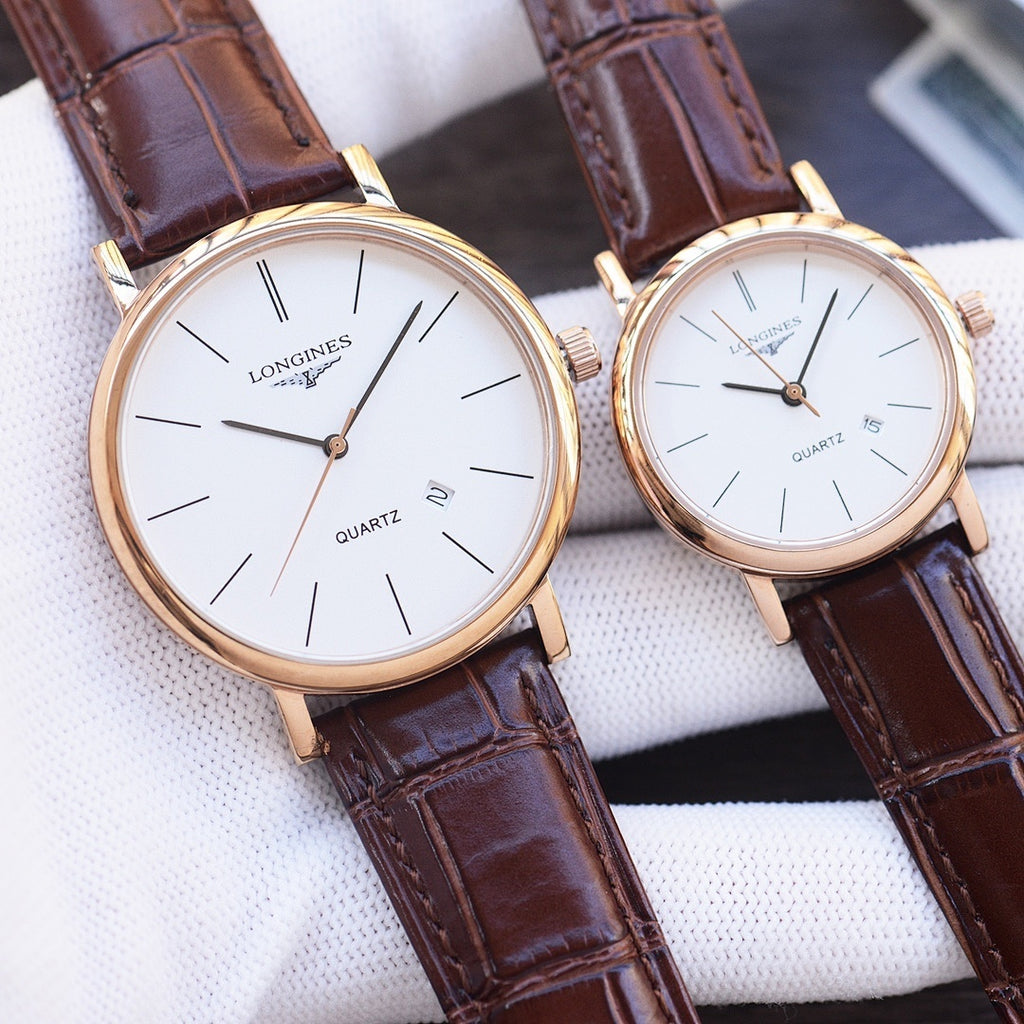 Quartz wristwatch pair with white dials and brown leather straps, rose-gold tone cases