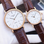 Quartz wristwatch pair with white dials and brown leather straps, rose-gold tone cases
