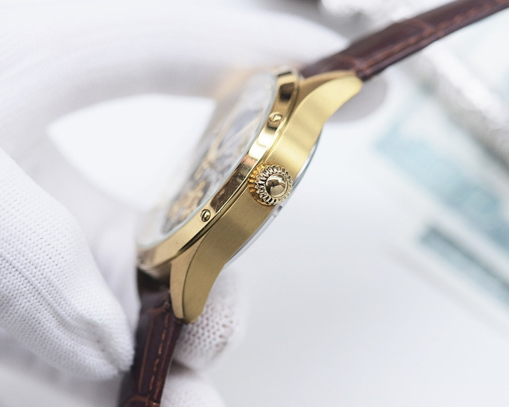 Longines leather watch case profile with gold-tone finish and brown leather strap