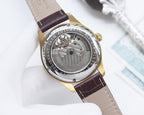 Longines skeleton watch with gray rear dial, gold-tone case, brown leather strap