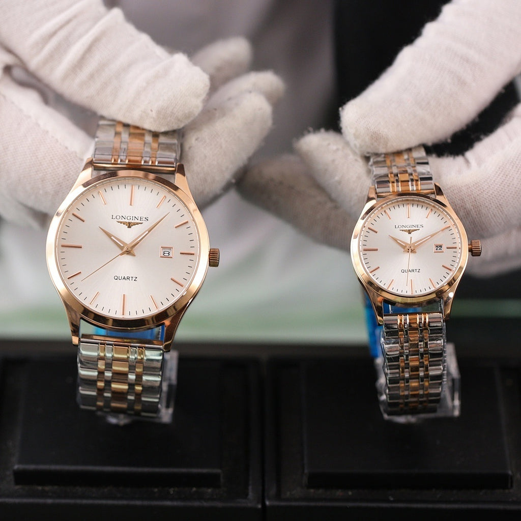 Longines quartz watch with rose-gold case and silver bracelet, white dial