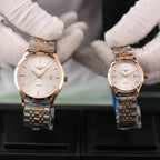 Longines quartz watch with rose-gold case and silver bracelet, white dial