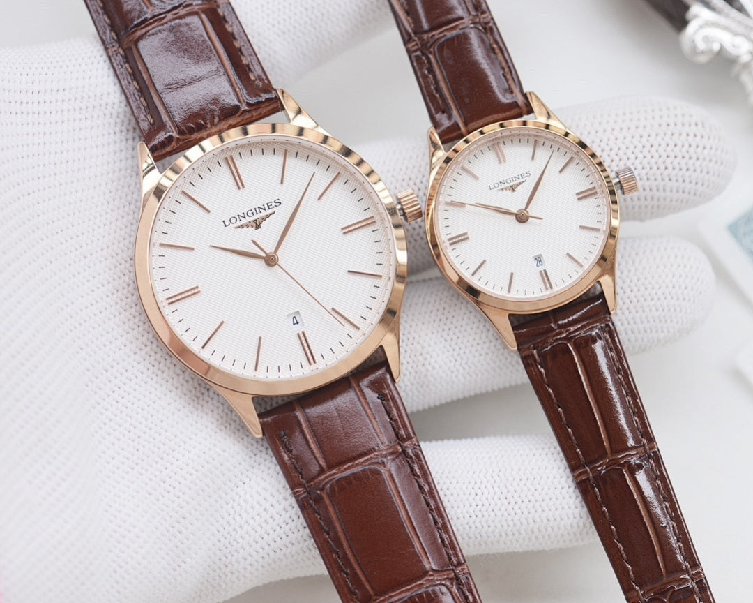 Rose gold Longines watches with white dials and brown leather straps, two watches side by side