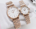 Rose gold Longines watches with white dials and linked metal bracelets, two views together
