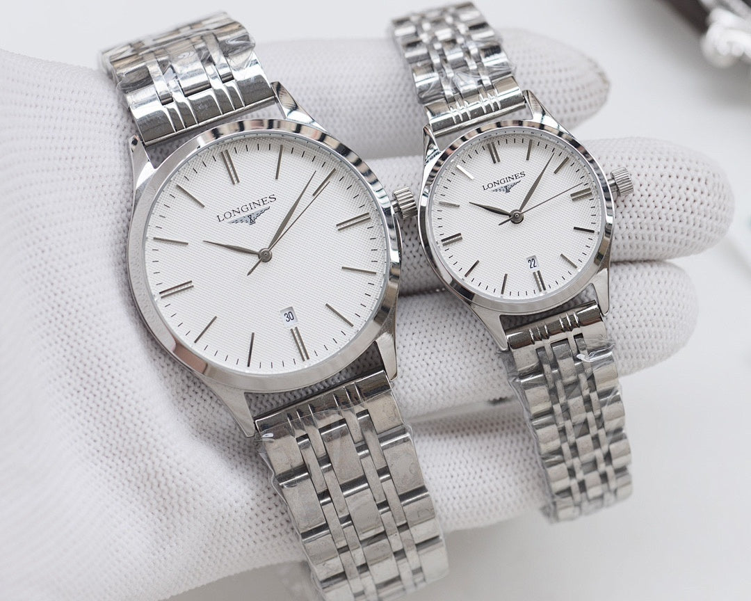 Longines watches with silver metal bracelets and white dials, two watches side by side