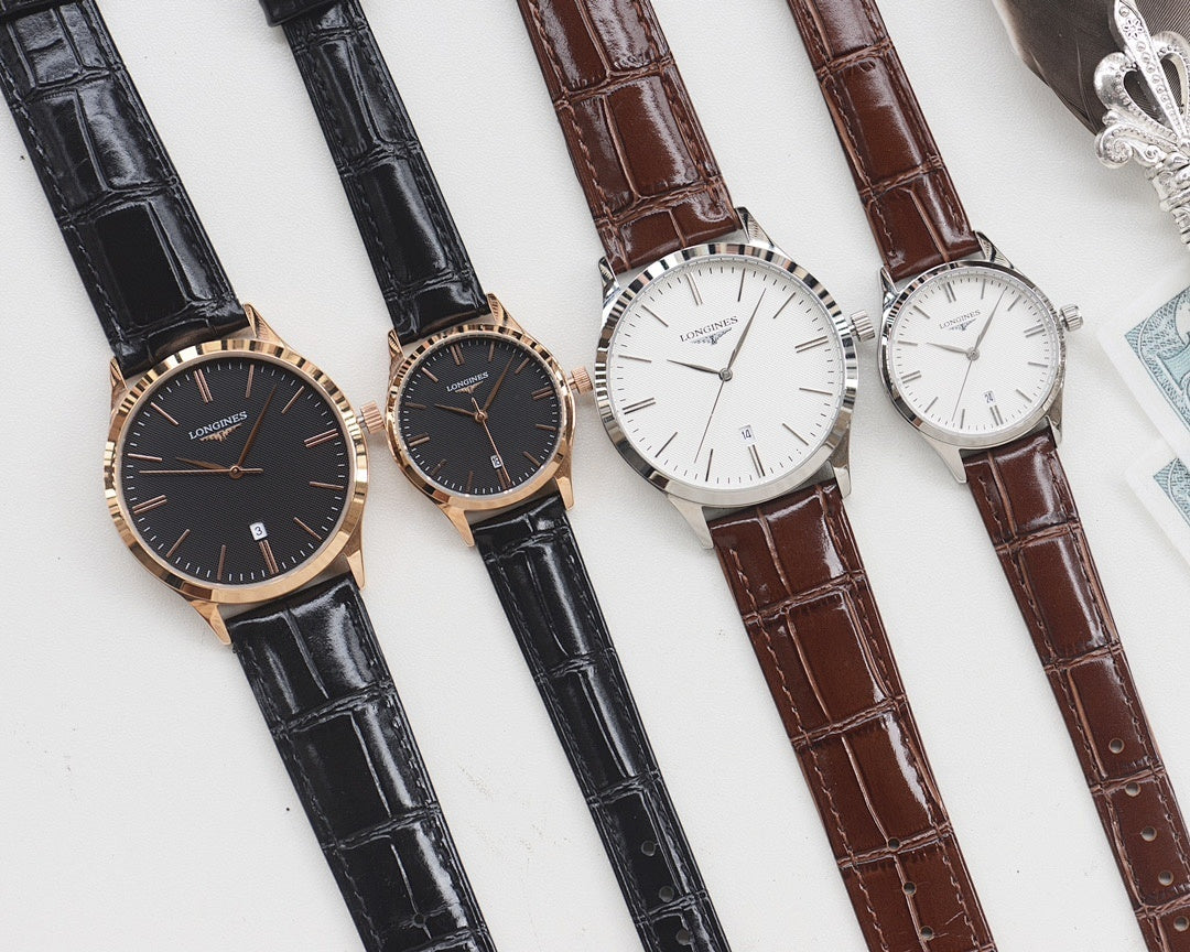 Set of Longines watches with leather straps in black and brown, mix of dark and white dials