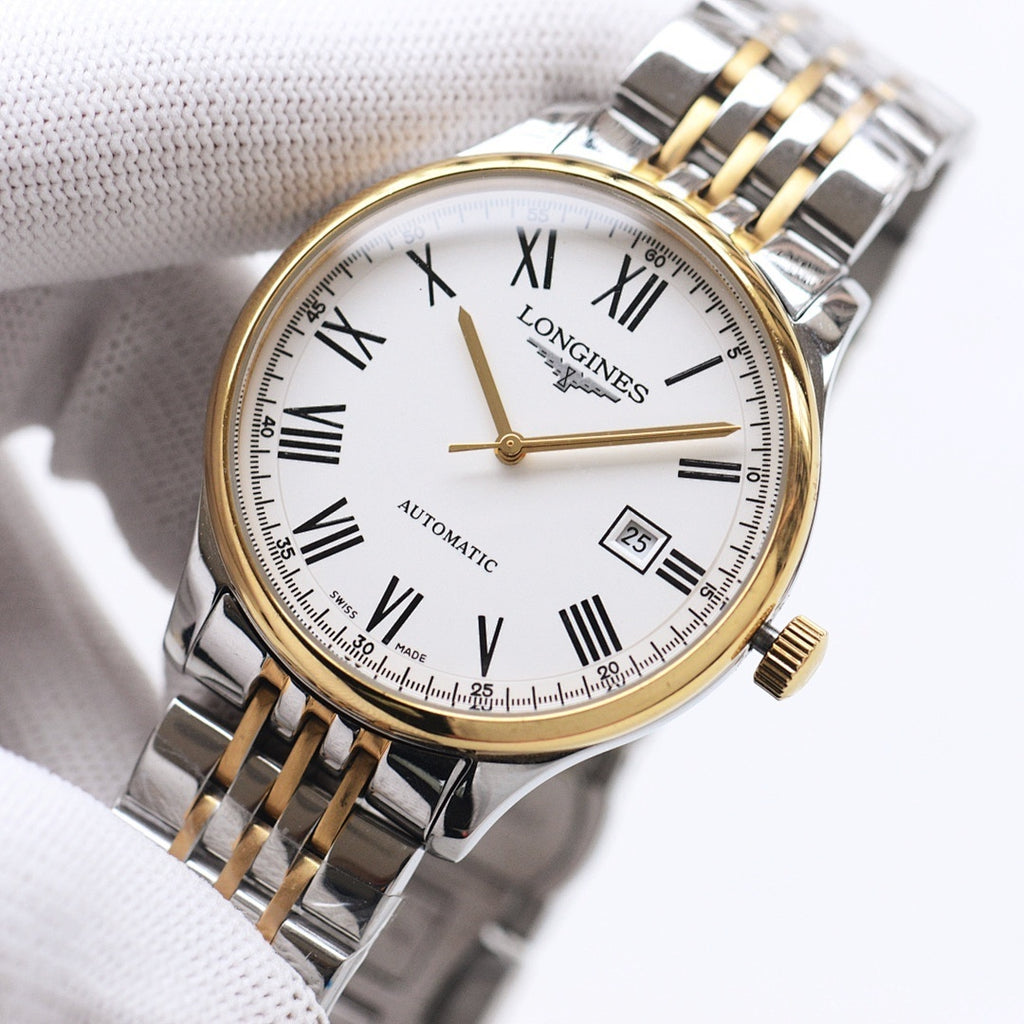 Longines two-tone automatic wristwatch with white dial, Roman numerals, and date