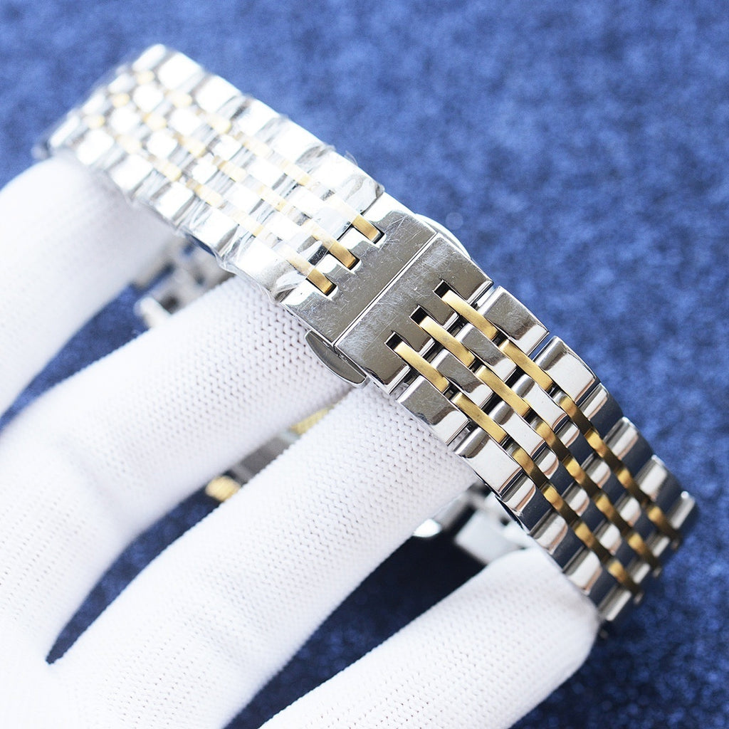 Longines watch with two-tone steel bracelet links and gold-toned case side