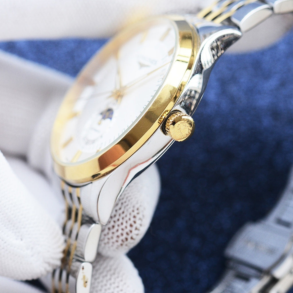 Longines watch with gold-toned crown and two-tone case, white dial