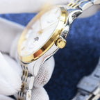 Longines watch with gold-toned crown and two-tone case, white dial