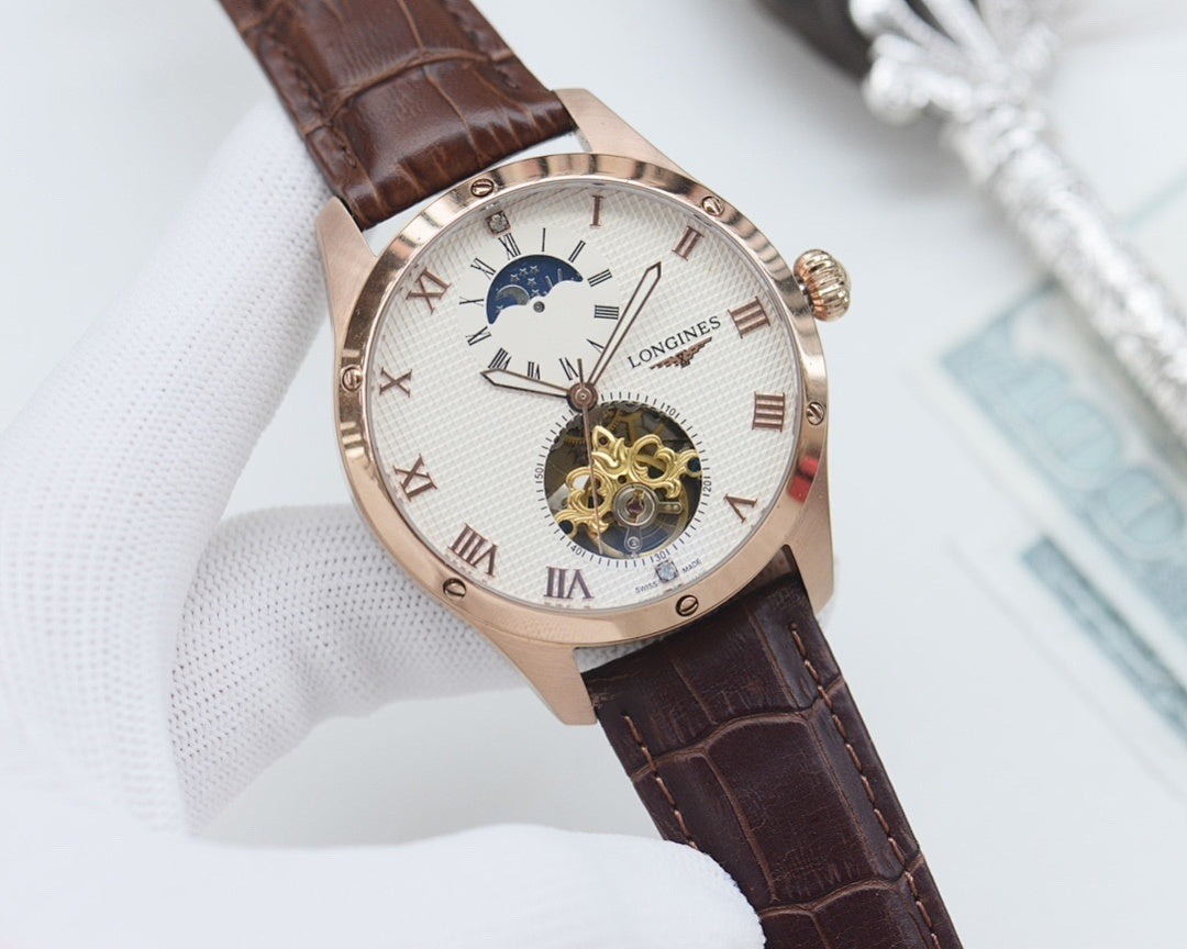 Longines wristwatch, light dial with blue accents, brown leather strap, skeleton center