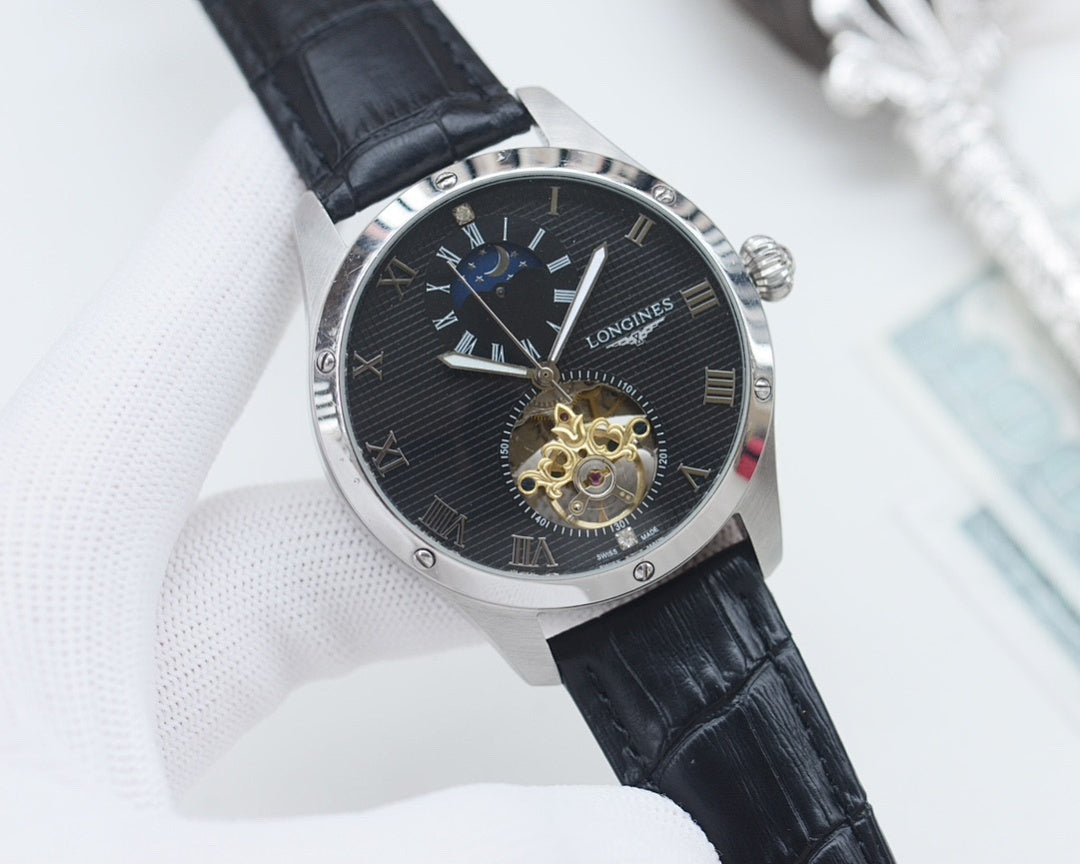 Longines timepiece, dark dial, black leather strap, silver tone case, open-heart skeleton
