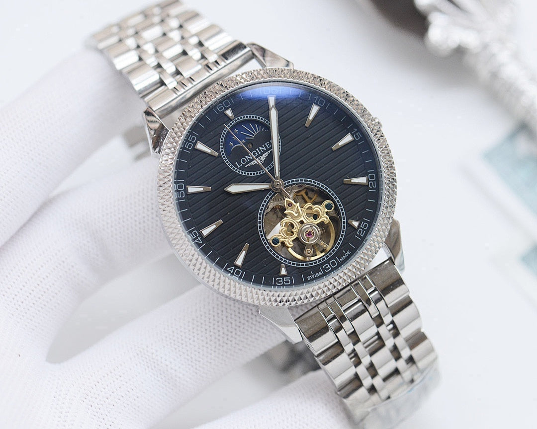 Silver-tone Longines wristwatch with dark blue dial and metal bracelet, open-work subdial