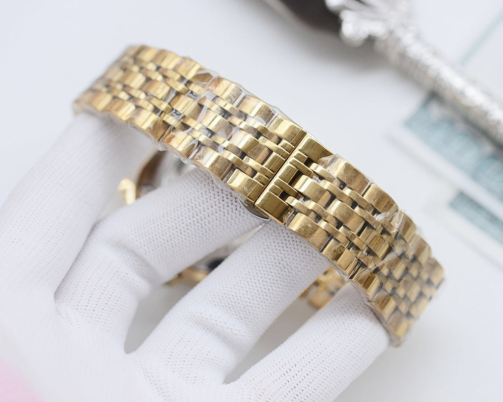 Gold-tone Longines metal bracelet band with linked clasp, shown side view