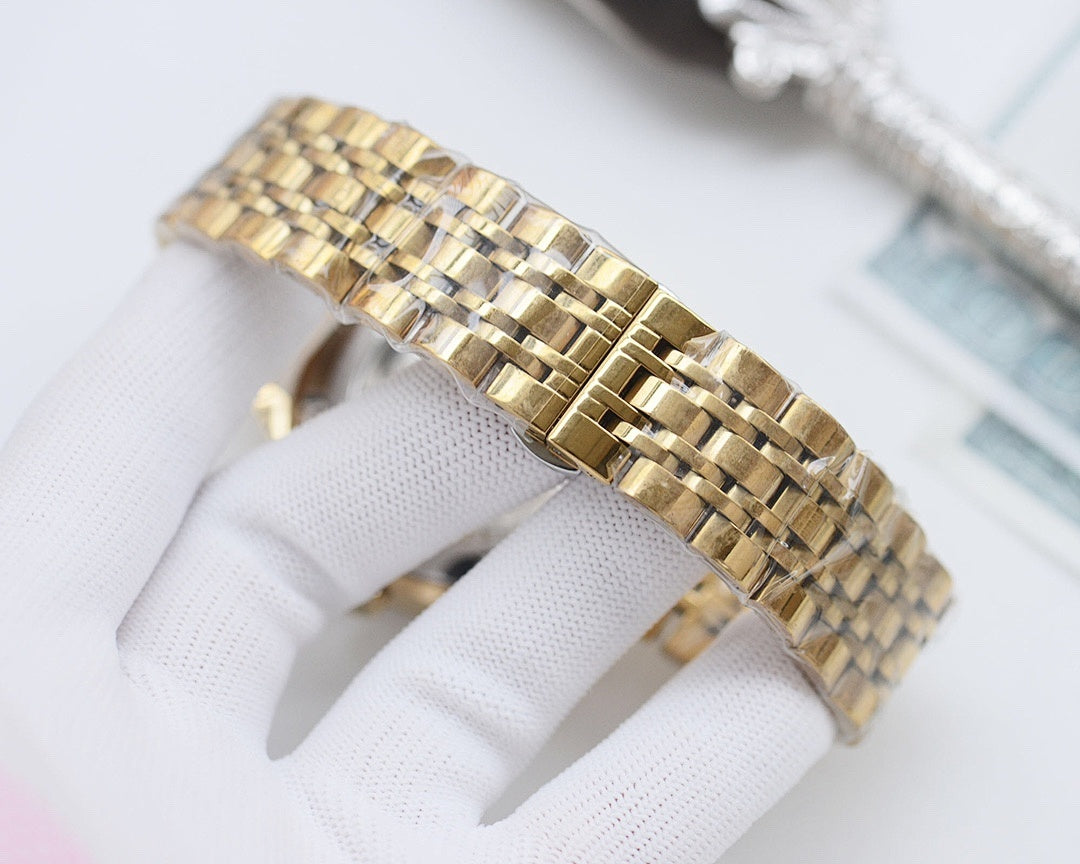 Gold-tone Longines metal bracelet band with linked clasp, shown side view