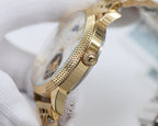 Gold-tone Longines wristwatch side profile with crown and textured case