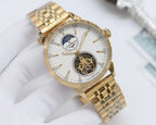 Gold-tone Longines wristwatch with white dial and metal bracelet, open-work subdial