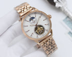 Gold-tone Longines wristwatch with white dial and metal bracelet, skeleton-style subdial
