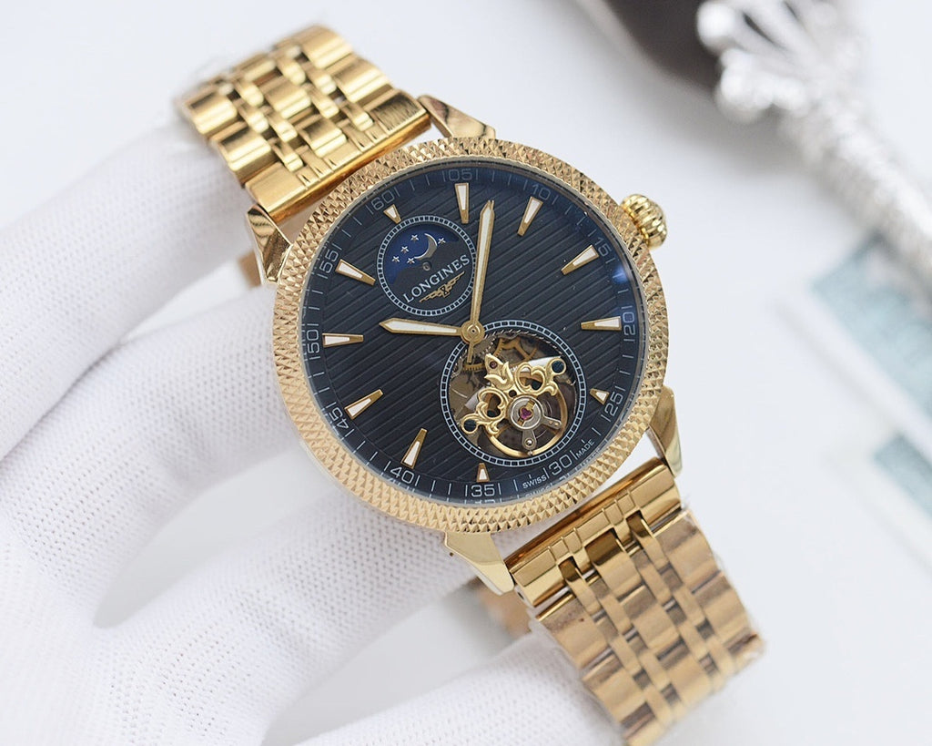 Gold-tone Longines wristwatch with dark blue dial and metal bracelet, open-work subdial
