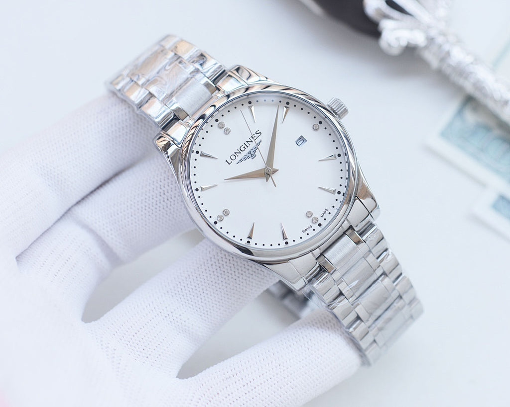 Two-tone stainless steel wristwatch with white dial and gold accents, angled view