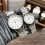 Longines wristwatch, silver-tone metal bracelet, white dial with Roman numeral markers