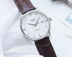 Longines automatic watch with silver-tone case, white dial, dark leather strap, bar indices