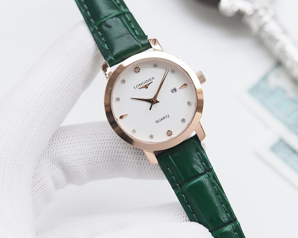 Longines watch with green leather strap, rose-gold case, and white dial