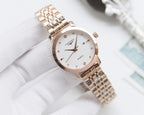 Longines watch with rose-gold case and two-tone metal bracelet, white dial
