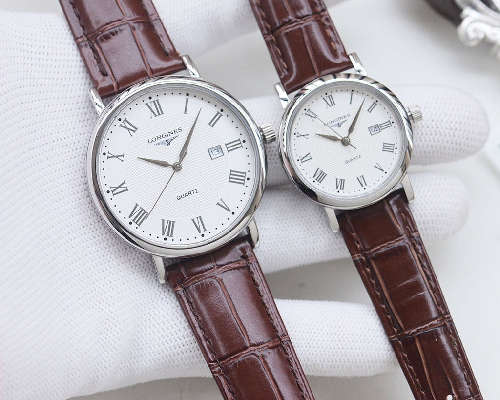 Pair of Longines watches with silver cases, brown leather straps, white dials