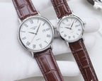 Pair of Longines watches with silver cases, brown leather straps, white dials