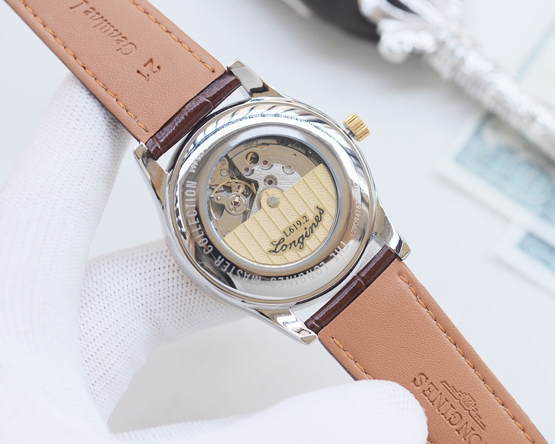 Longines watch caseback with visible mechanical movement, brown leather strap and clasp.