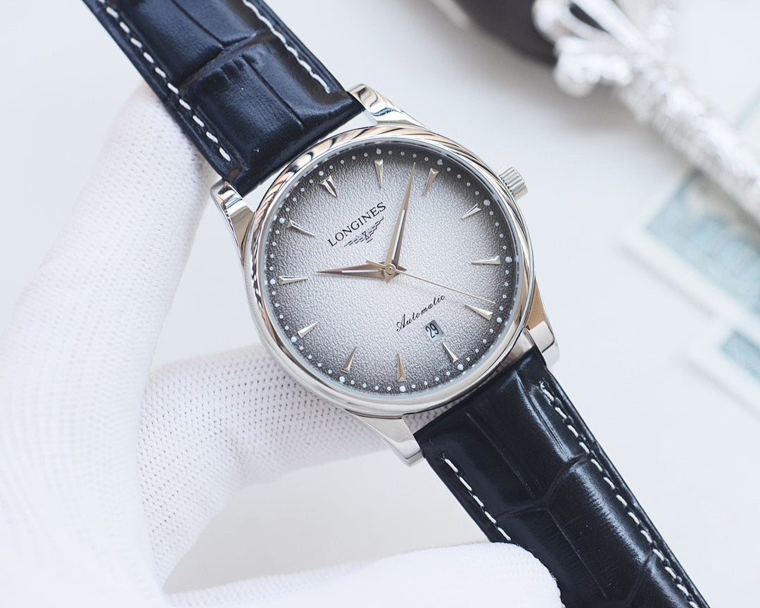 Longines analog watch with blue dial, black leather strap, silver bezel and crown.