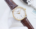 Analog watch with white dial and brown leather strap, gold case, stick hands.