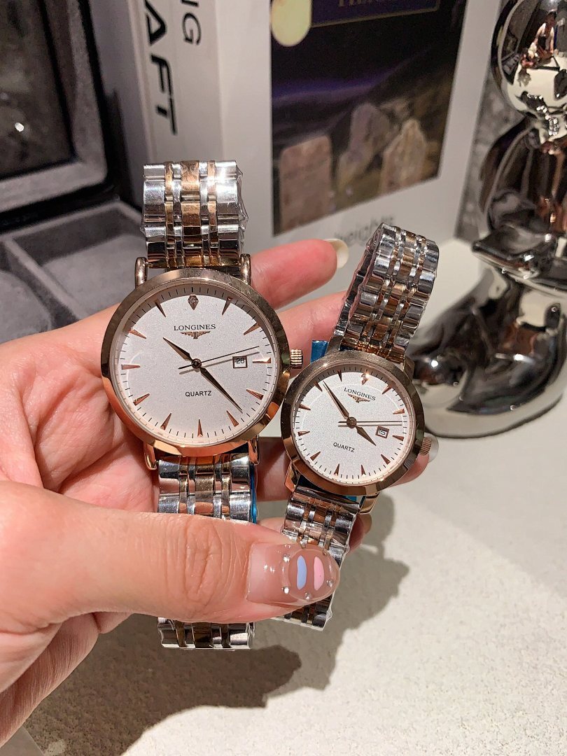 Longines watch pair with silver metal bracelet; white dials and rose-gold accents