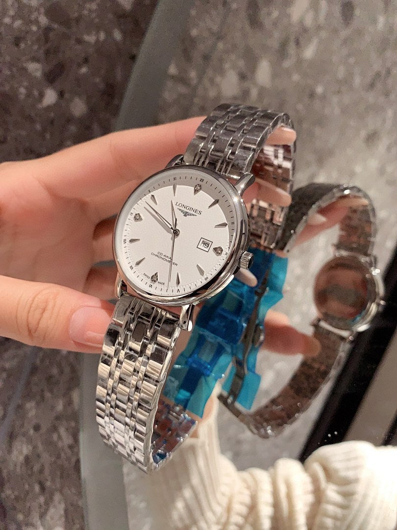 Longines stainless-steel wrist watch with white dial and metal bracelet, side profile view