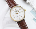 Longines automatic watch with white dial, brown leather strap, gold-tone accents and crown