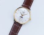 Longines watch with white dial, brown leather strap, and gold-tone round case