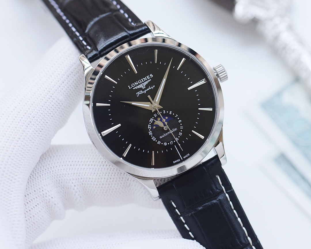 Longines watch with black dial and black leather strap, round silver case