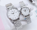 Longines quartz wristwatch with silver metal bracelet and white dial, Roman numerals
