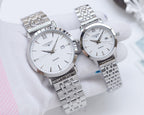 Longines quartz wristwatch with silver metal bracelet and white dial, Roman numerals